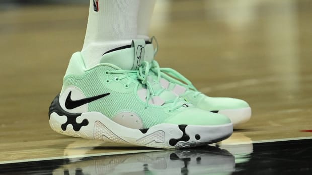Paul George wearing a Nike PG 6 PE.